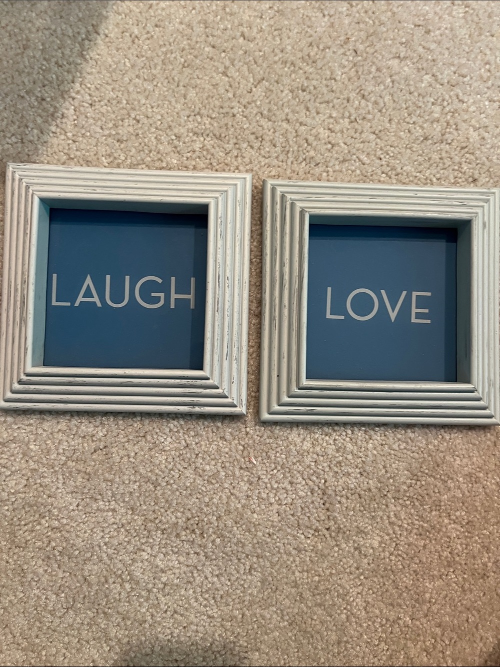 'Laugh' and 'Love' Plastic Frames